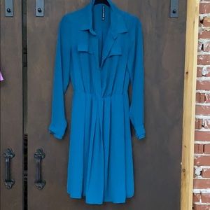 Teal flowing dress. Above knees